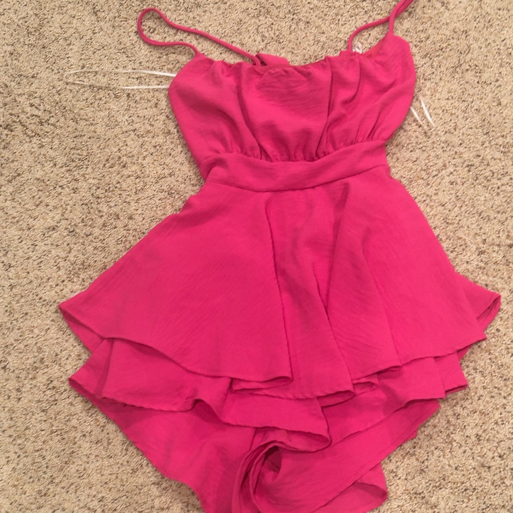 Pink romper brand new size small